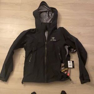 Arcteryx water Proof jacket with hood size MEDIUM